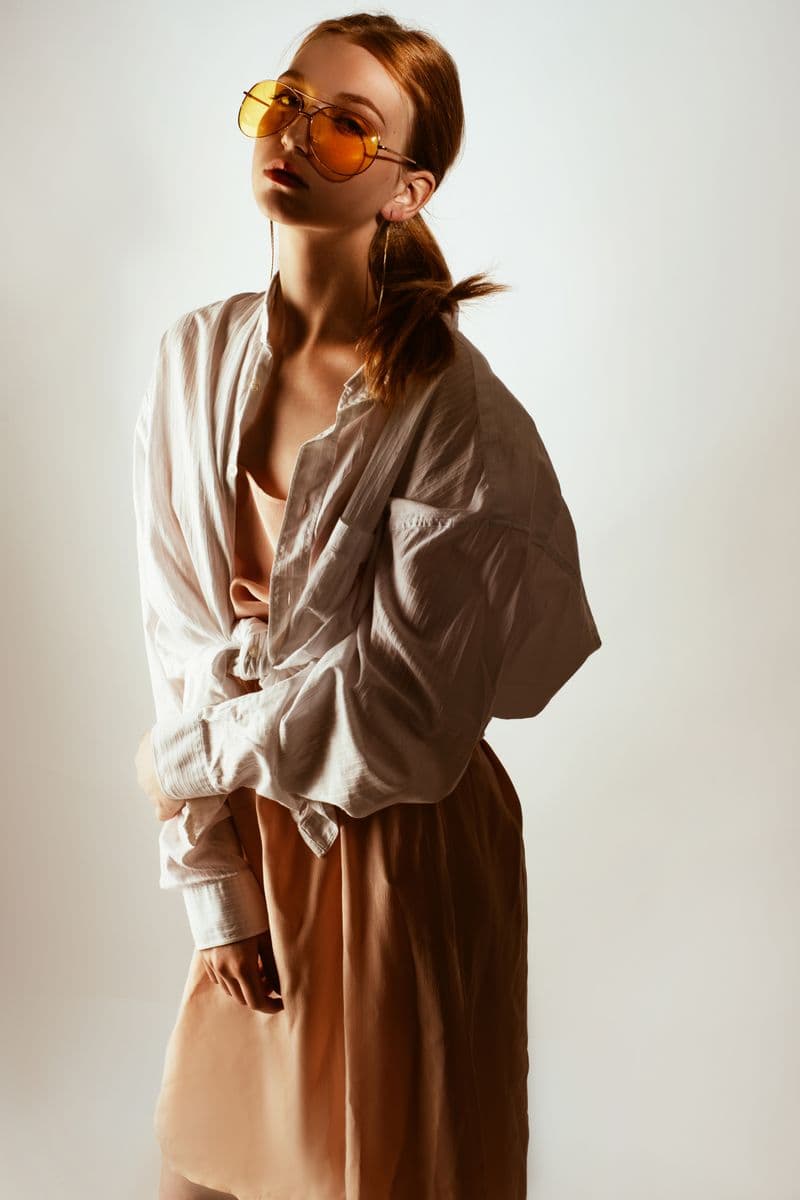 Woman in an elegant camel-toned ensemble
